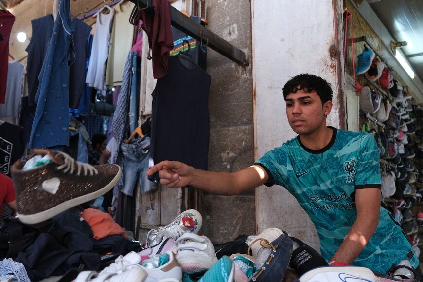 Many young Iraqis shop for vintage clothes for their durability and style with imported items finding new life in local wardrobes