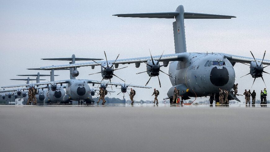 Bundeswehr troops arrive back in Germany after overseeing the evacuation from Sudan of more than 700 foreign nationals over the past week