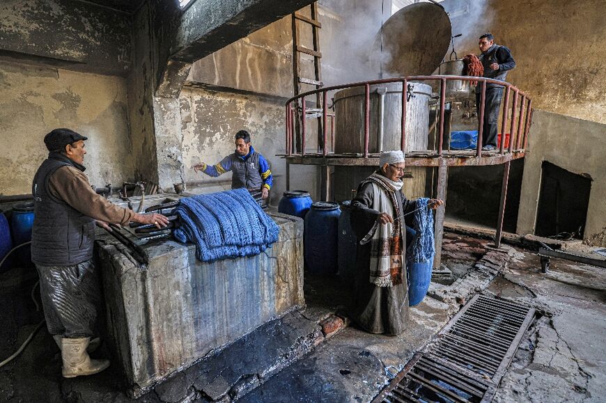 Threads for rugs are dyed at the Kahhal workshop in the Basatin district of Cairo