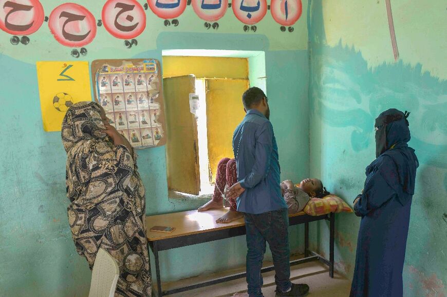 A makeshift emergency room set up by Sudanese volunteers in Omdurman, the twin city of Khartoum where the war has left few health facilities functioning normally