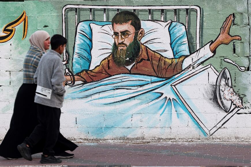 A mural in Gaza City depicts Khader Adnan, who died Tuesday May 2, 2023 in Israeli custody after nearly three months on hunger strike