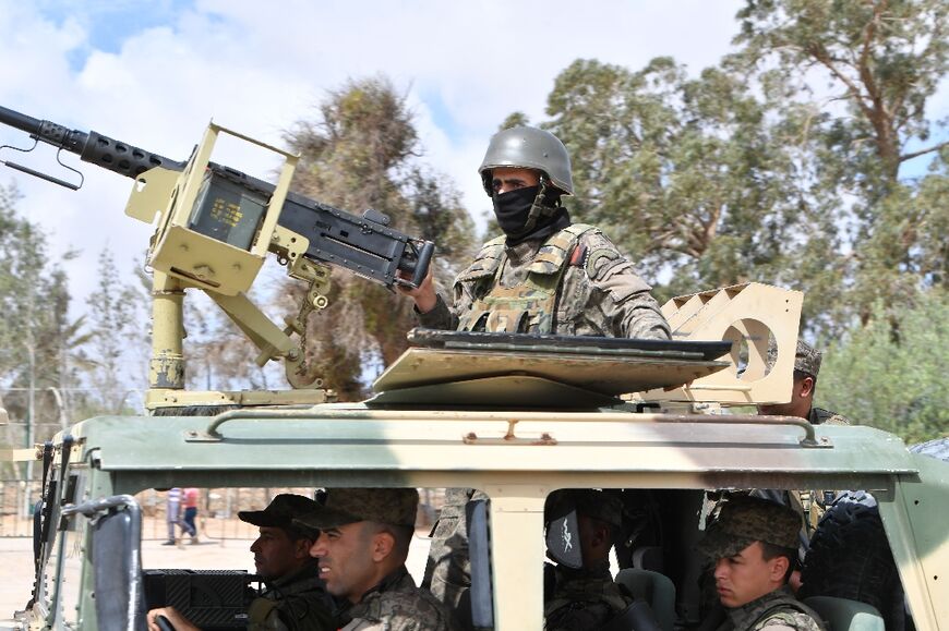 Tunisian soldiers secure the area near the Ghriba synagogue following the shooting rampage 