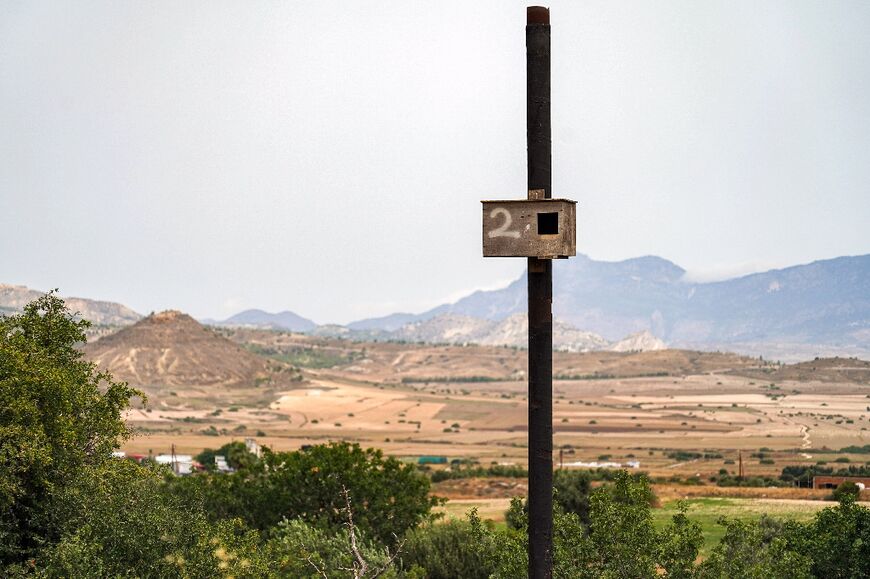 Around 50 light wooden boxes have been installed on tree trunks as part of an initiative to encourage farmers to abandon using poison