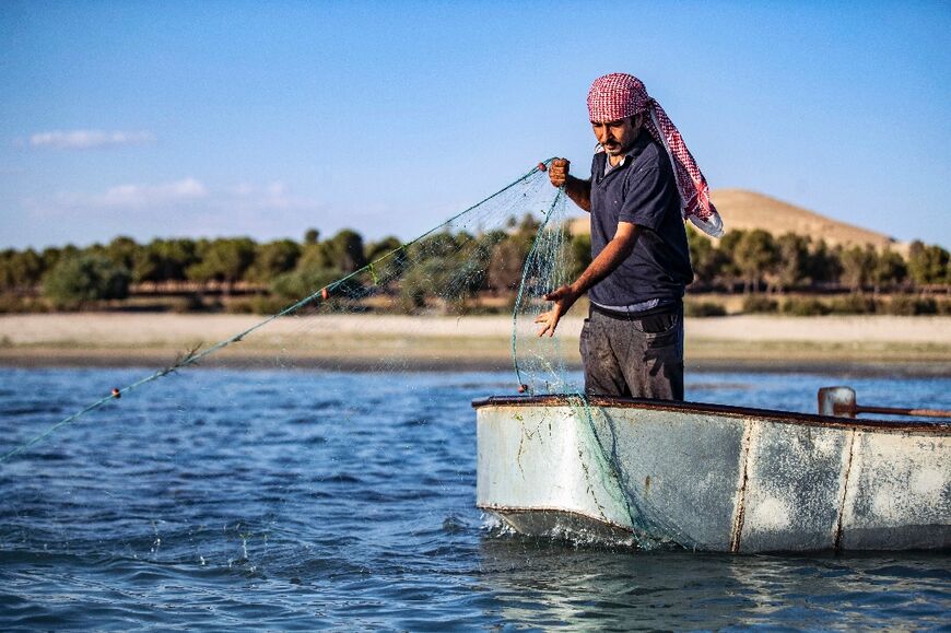 Local fishermen blame the river's low water levels, lack of rainfall, worsening pollution and overfishing for the sharp decline in fish stocks