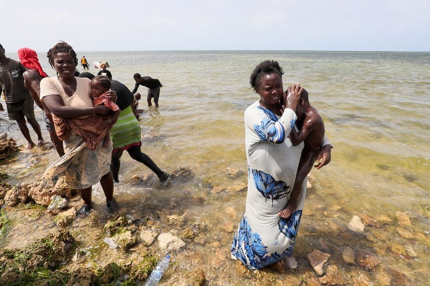 Migrants stranded at the shore on the Libyan-Tunisian border in the Ras Jedir area at the end of July