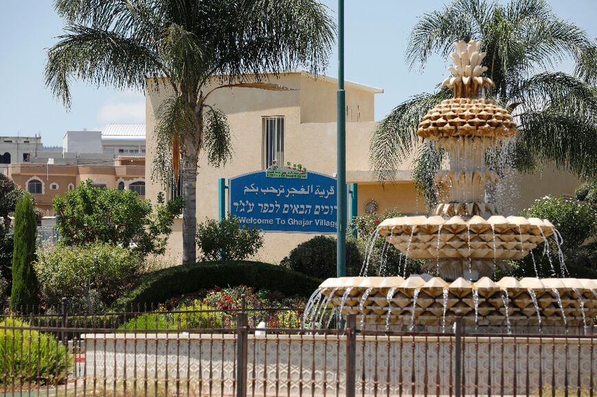 A sign in Arabic, Hebrew and English in Ghajar which straddles the border