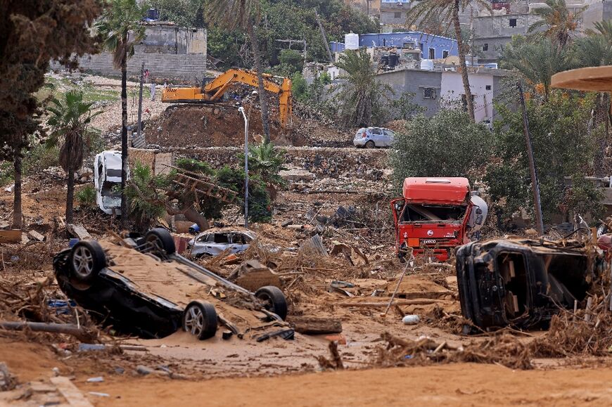 Derna has become a mud-caked wasteland of smashed buildings, crushed cars and uprooted trees with one resident saying "there is no life left"