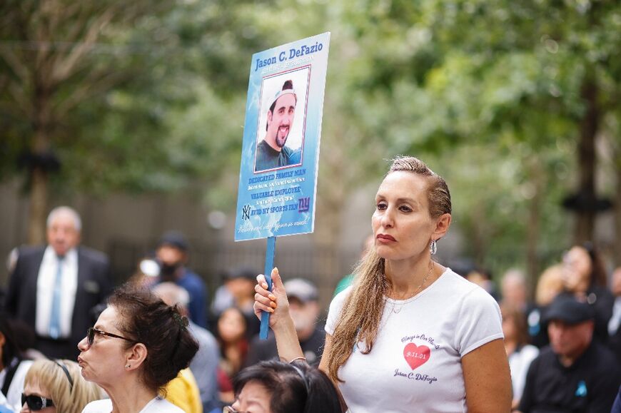 Family members of victims of the 9/11 attack at the National September 11 Memorial in New York to mark  the attack's 22nd anniversary 