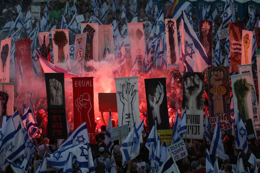 Flares, flags and banners at the protest