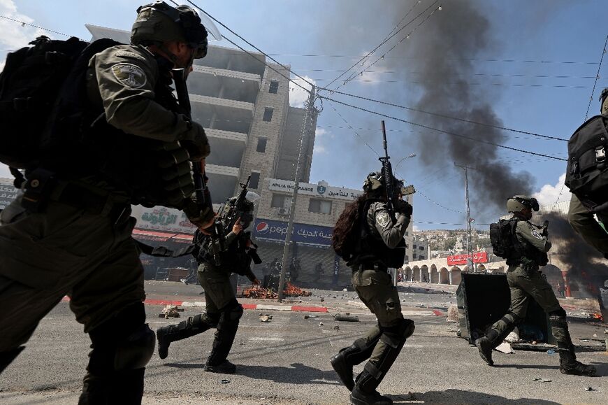 Israeli soldiers deploy during the funeral of Labib Damidi