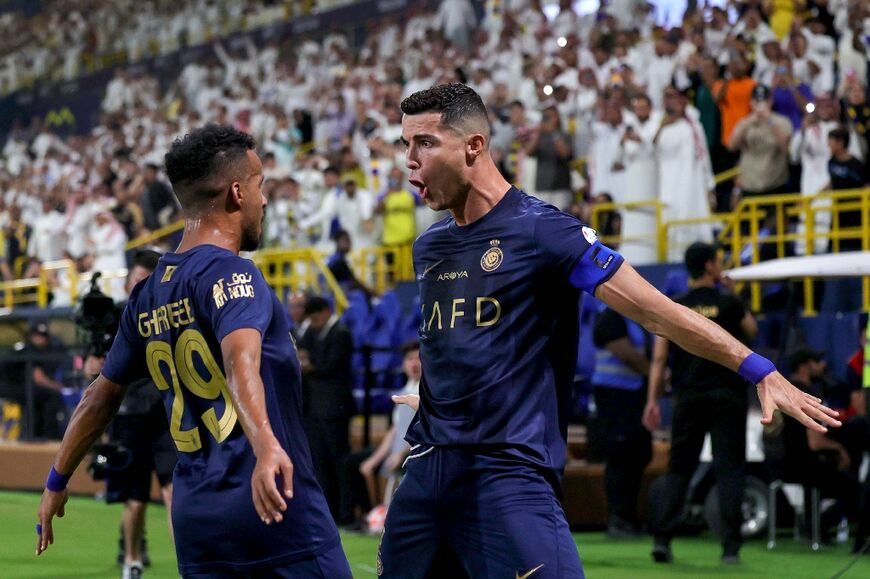 Portuguese forward Cristiano Ronaldo (R) joined Al-Nassr in a lucrative deal in January