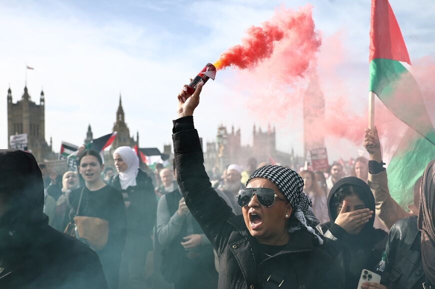 Some pro-Palestinian protesters let off smoke canisters