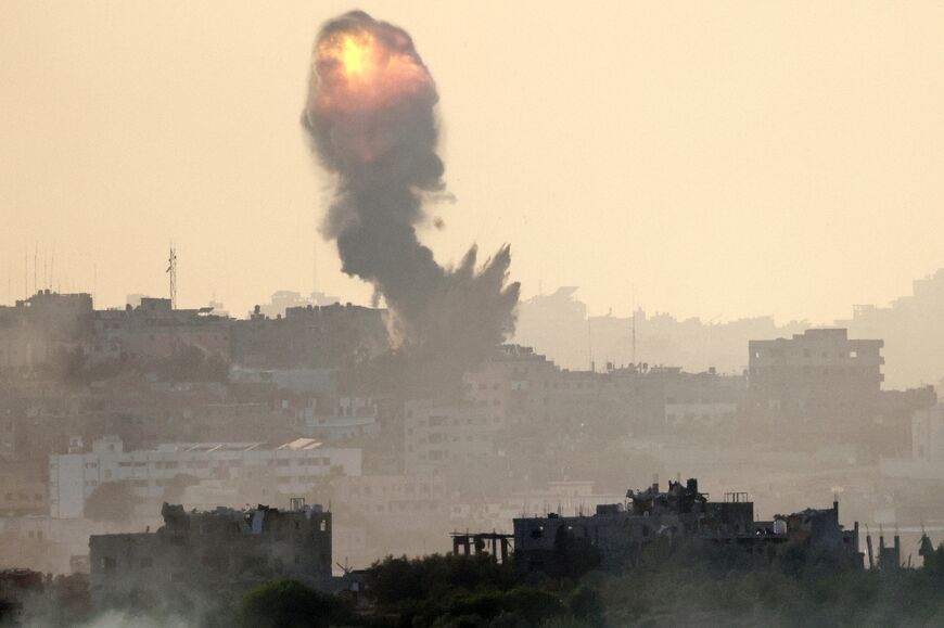 Smoke billows from Israeli bombardment in the north of the Gaza Strip on October 30, 2023