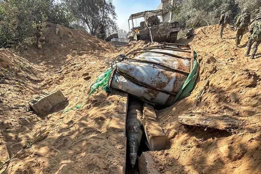 This handout picture released by the Israeli army shows a projectile reportedly belonging to Al-Quds Brigades, the military wing of the Islamic Jihad movement, discovered during operations in northern Gaza