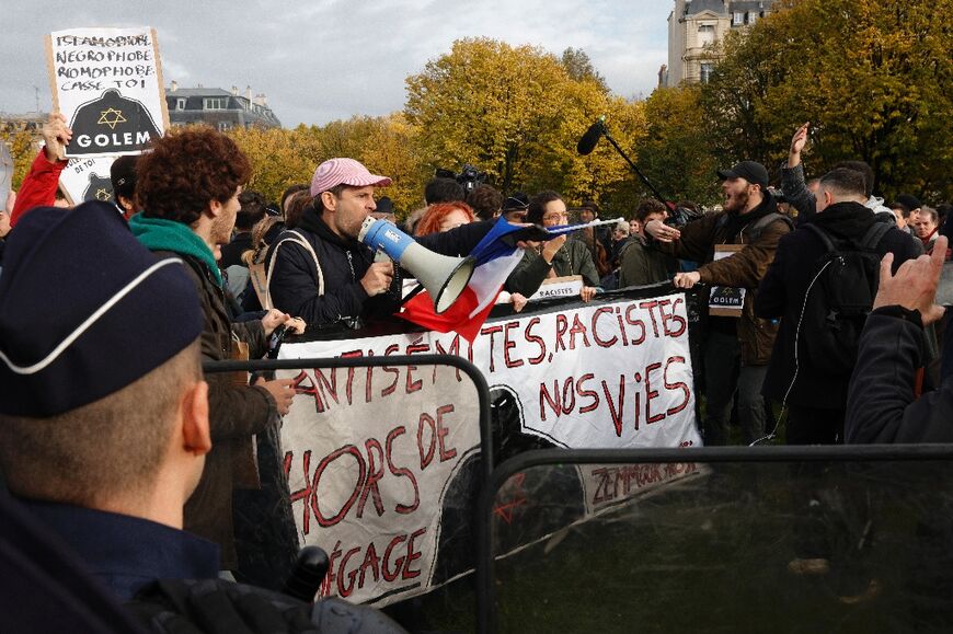 Counter-demonstrators tried to stop far-right leader Marine Le Pen from taking part