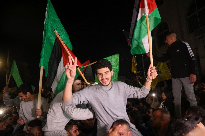 Palestinian prisoners celebrate their freedom after being released from Israeli jails in exchange for Israeli hostages held in Gaza