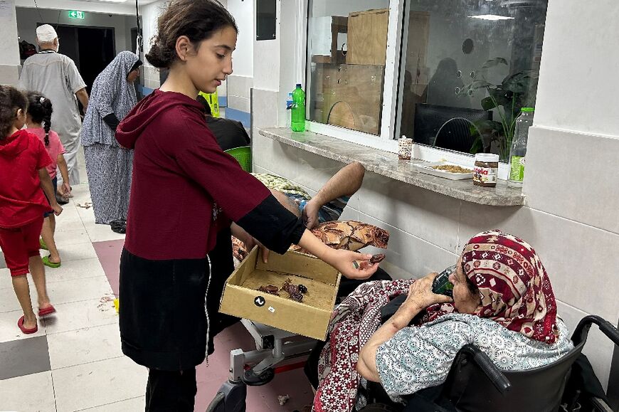 Patients and internally displaced people are pictured at Al-Shifa hospital in Gaza City on November 10, 2023, amid ongoing battles between Israel and the Palestinian Hamas movement.