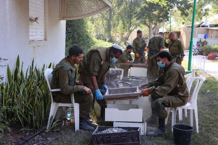 Soldiers have helped the archaeologists to sift through ash for human remains