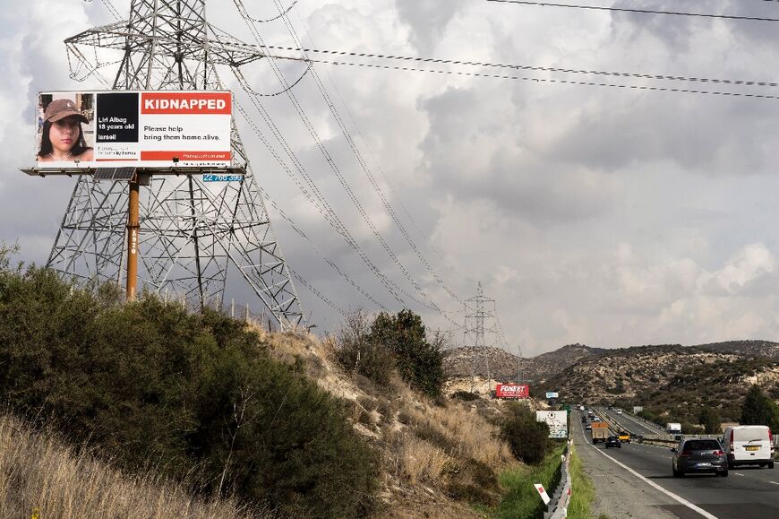 A billboard displays the photo of Israeli hostage Liri Albag 