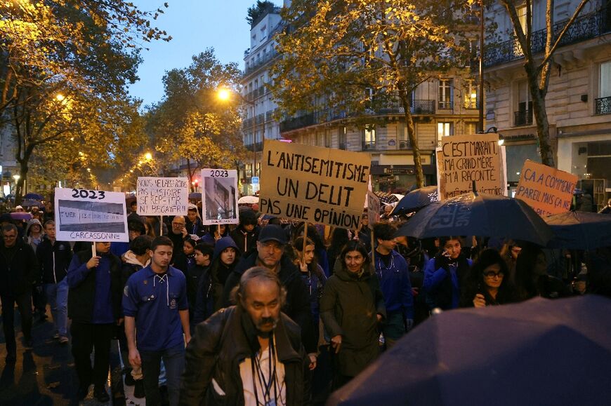 Marchers brought placards including one reading 'anti-Semitism is a crime, not an opinion'