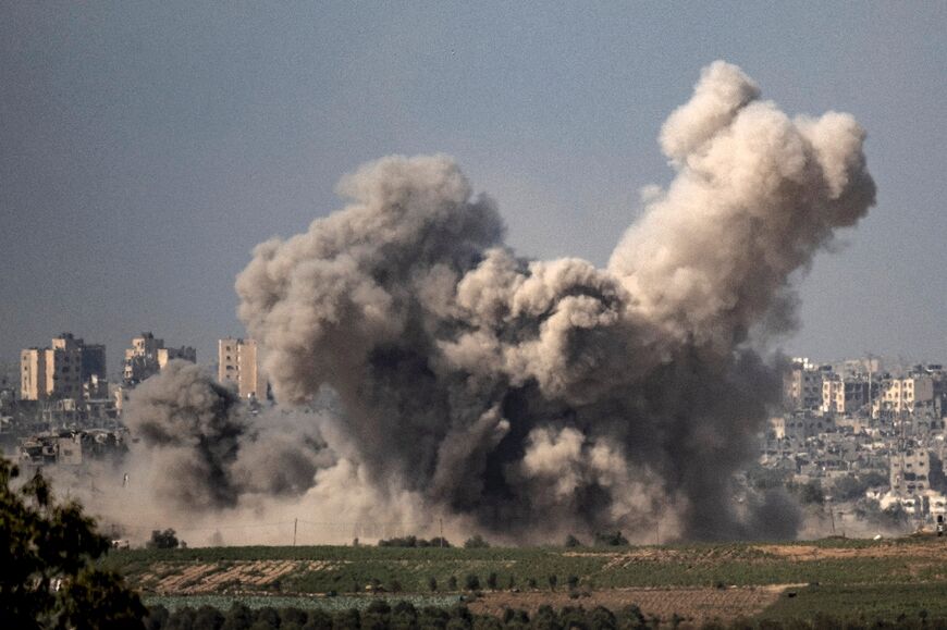 This picture taken from Sderot along the border with the Gaza Strip early on November 6, 2023 shows smoke rising from northern Gaza after Israeli strikes