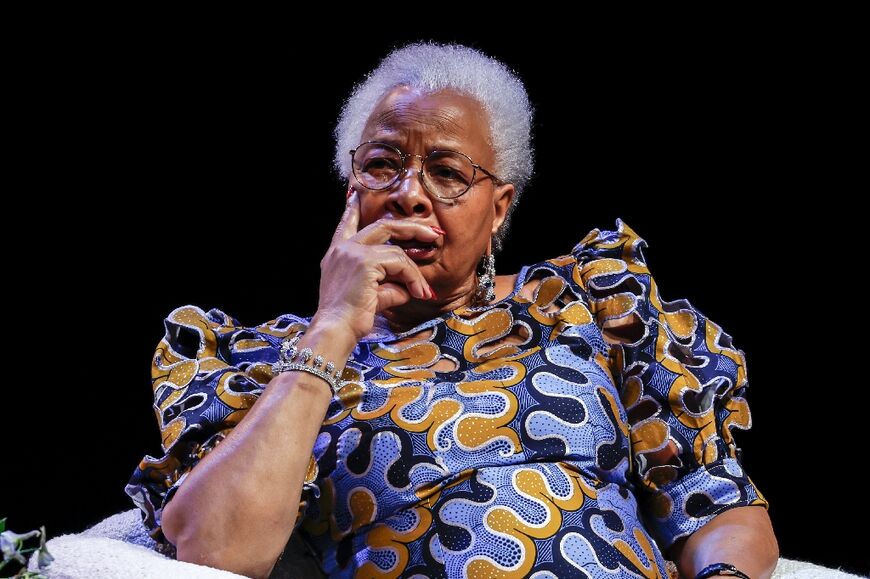 Nelson Mandela’s widow Graca Machel listens to Malala give her lecture 