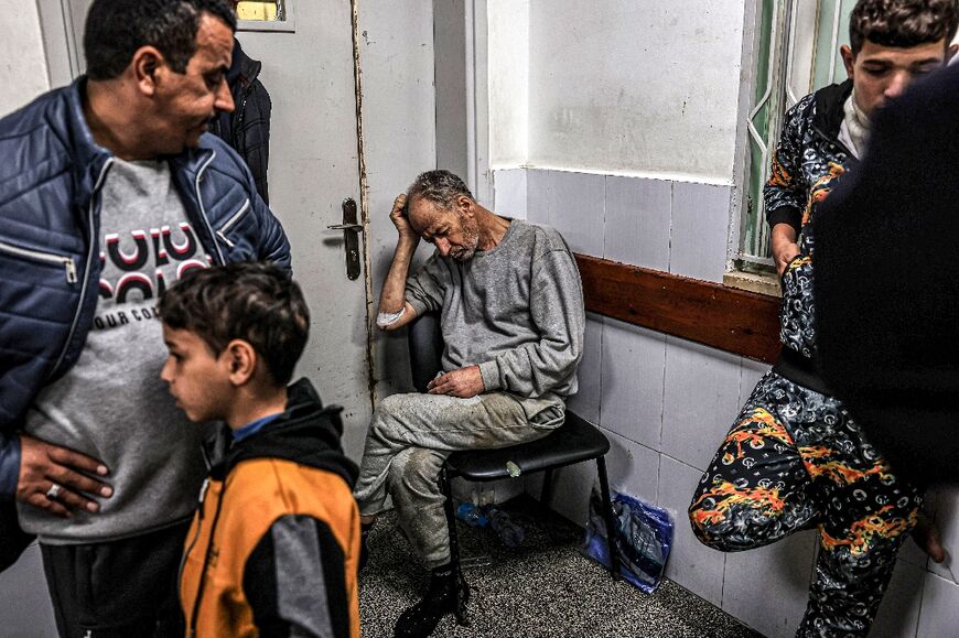 A Palestinian man, released after detention by Israeli forces in Gaza, awaits treatment at al-Najjar hospital in Rafah