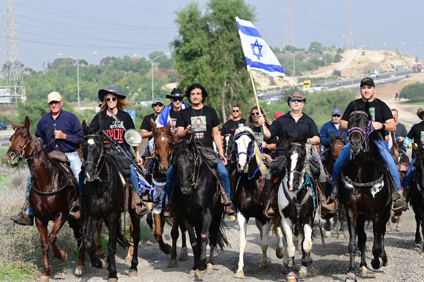 Friends and relatives of Israeli Idan Shtivi, held hostage by Hamas, take part in a cavalcade to Jerusalem calling for the release of all hostages