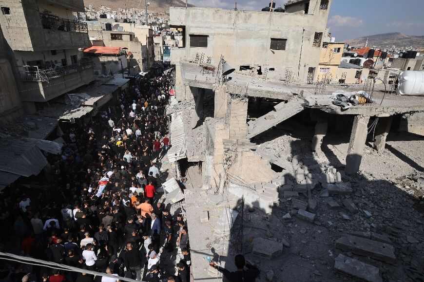 Funeral mourners on November 18, 2023 at Balata refugee camp in the Israeli-occupied West Bank after a rare Israeli air strike on the territory killed five fighters from Fatah's armed wing