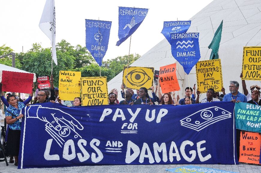 Protesters at COP28 call for wealthy nations to pay up for the damage caused by their greenhouse gas emissions