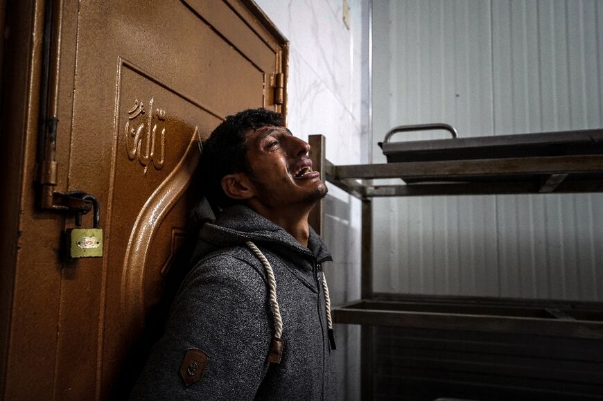 A Palestinian man mourns a loved one killed in Israeli bombardment in Khan Yunis