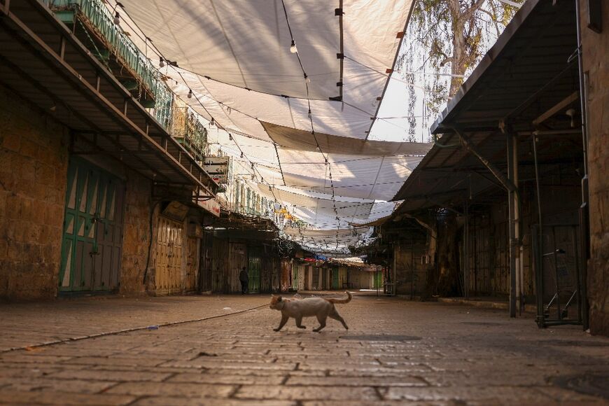 Shuttered shops in the occupied West Bank city of Hebron