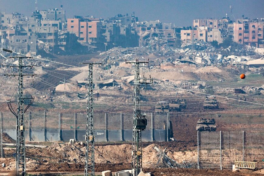 Israeli tanks returning from northern Gaza on December 15