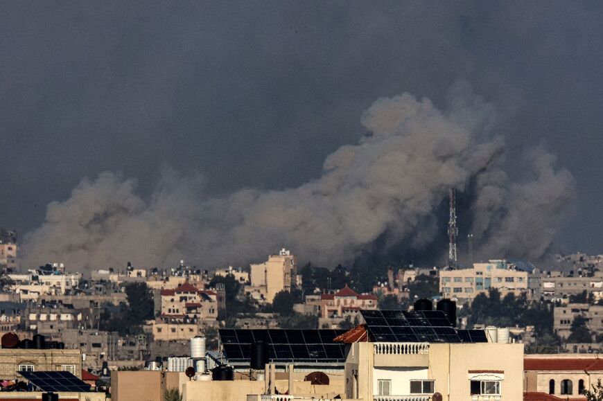 Smoke billows over Khan Yunis in the southern Gaza Strip during an Israeli bombardment