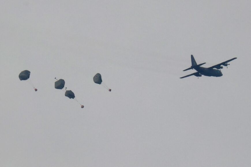 A Jordanian military aircraft drops humanitarian aid over Rafah 