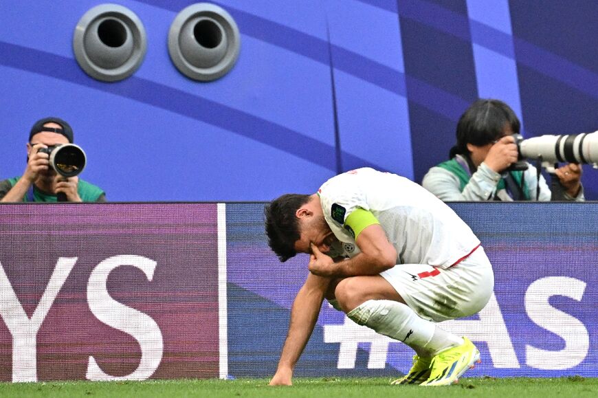 Iran's Alireza Jahanbakhsh celebrates his team's win over Japan