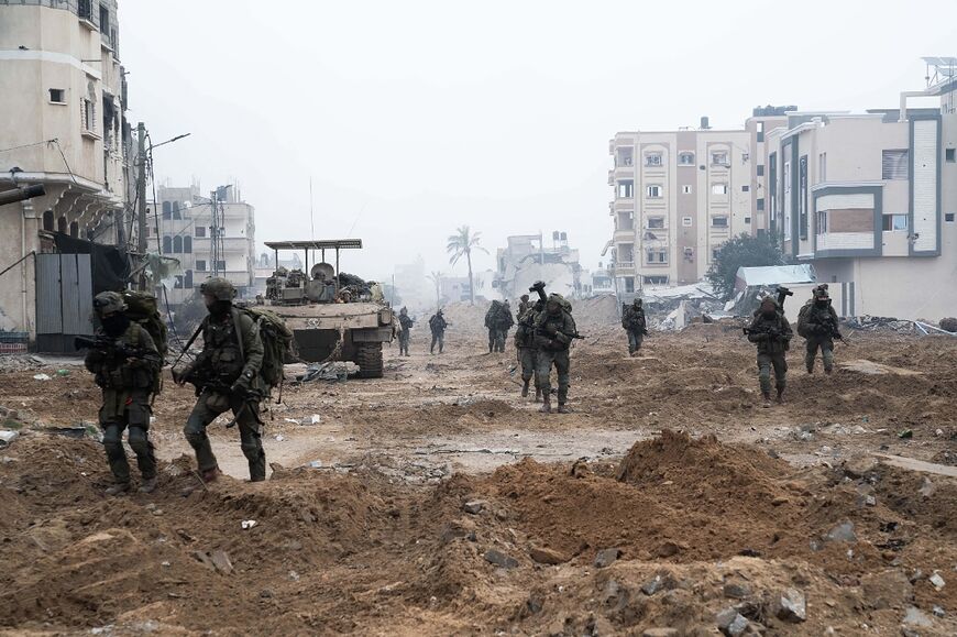 This handout picture released by the Israeli army on February 1, 2024 shows Israeli troops operating in the Gaza Strip, amid ongoing battles between Israel and the Palestinian militant group Hamas