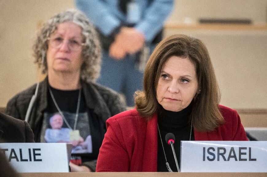 Israel's ambassador Meirav Eilon Shahar (R) delivers a speech next to former hostage Aviva Siegel