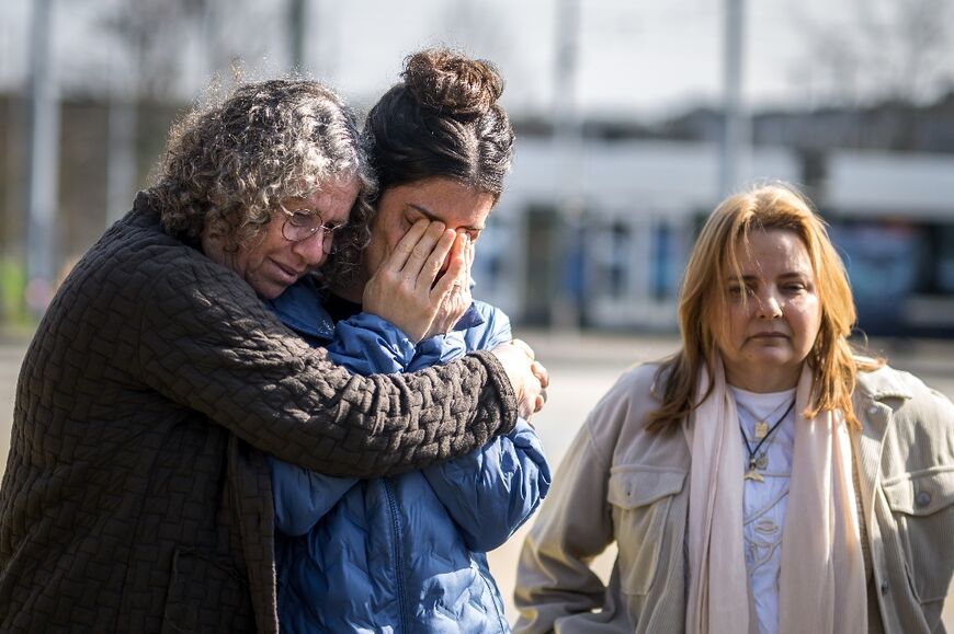 Former Hamas hostage Aviva Siegel comforted her daughter Elan Tiv during a meeting with sympathisers outside the UN in Geneva