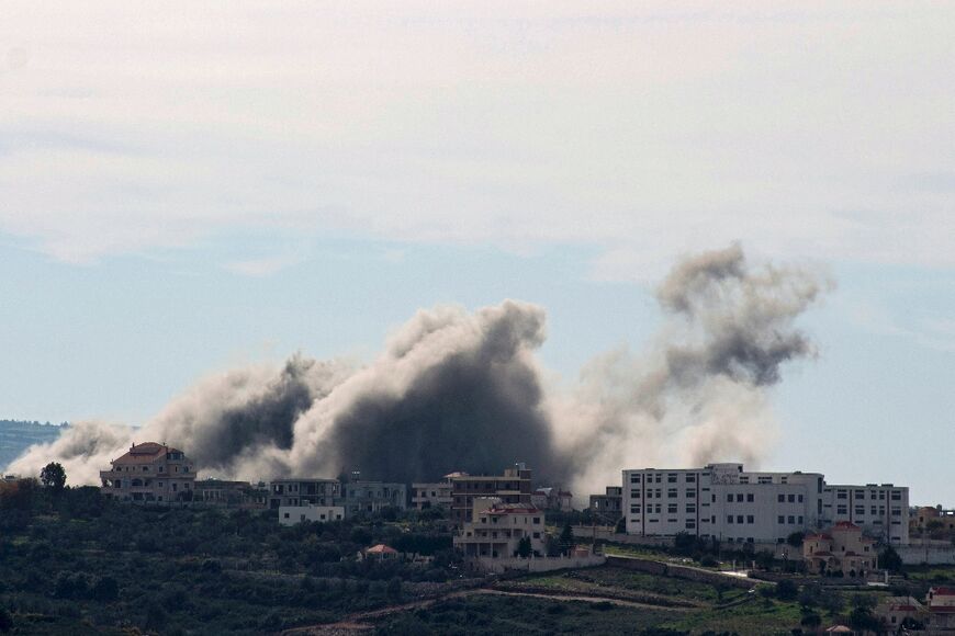 Smoke billows from the southern Lebanese village of Tayr Harfa following an Israeli airstrike that, according to Lebanon's official news agency, seriously wounded two people