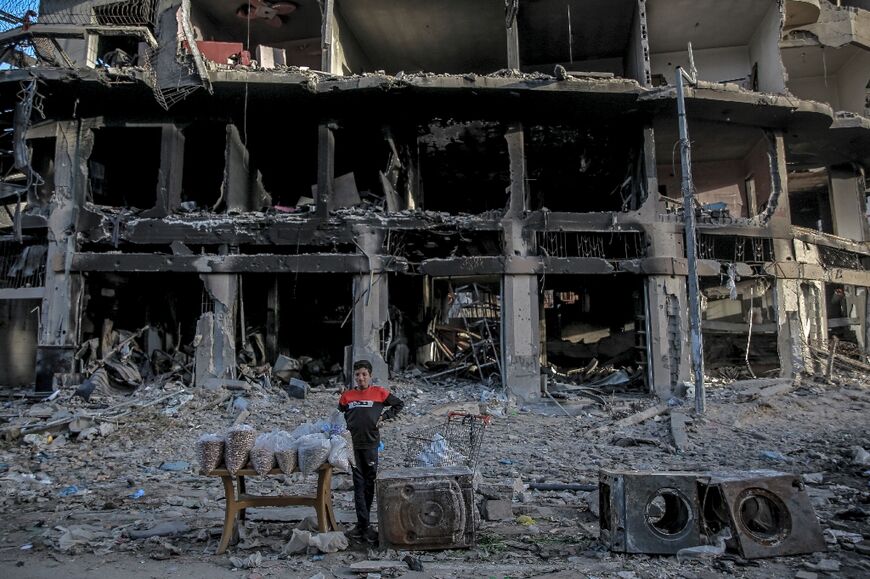 A Palestinian vendor in Gaza City, as the UN warns of famine