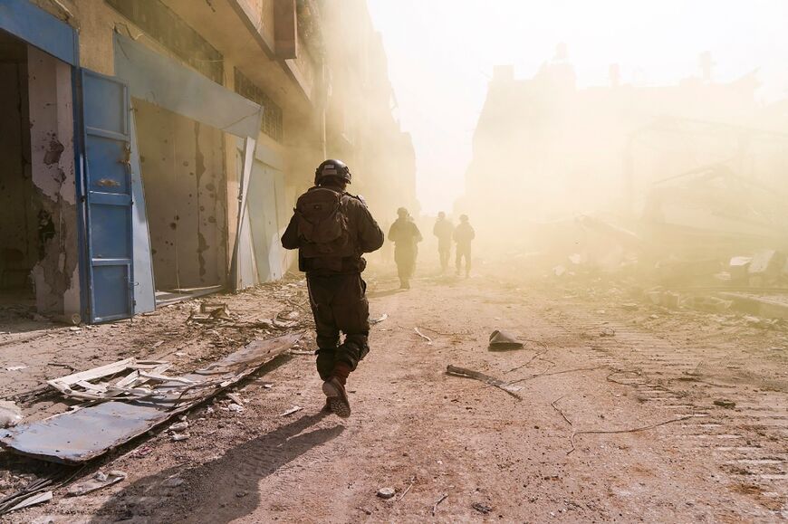 A handout picture released by the Israeli army showing troops on the ground in the Gaza Strip