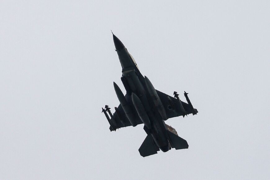 An Israeli Air Force fighter jet flies over the border area with south Lebanon