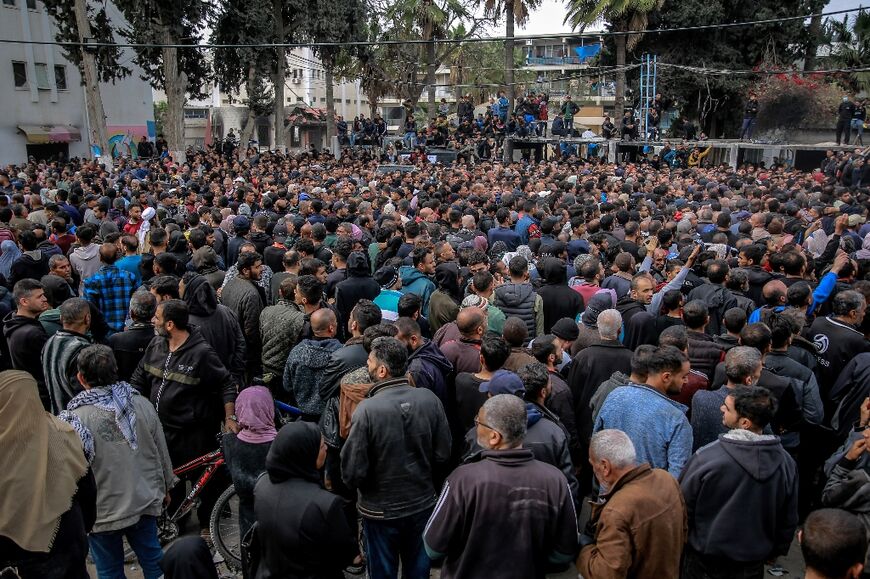 Palestinians queue during the distribution of humanitarian aid in Gaza City -- the United Nations has reported particular difficulty in accessing northern Gaza