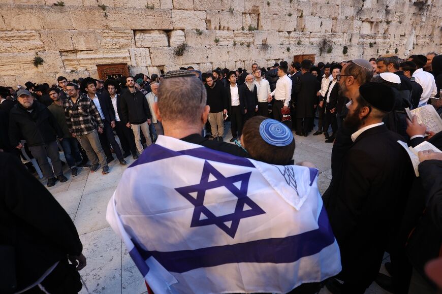 Israelis attend a mass prayer calling for the release of hostages held in Gaza 