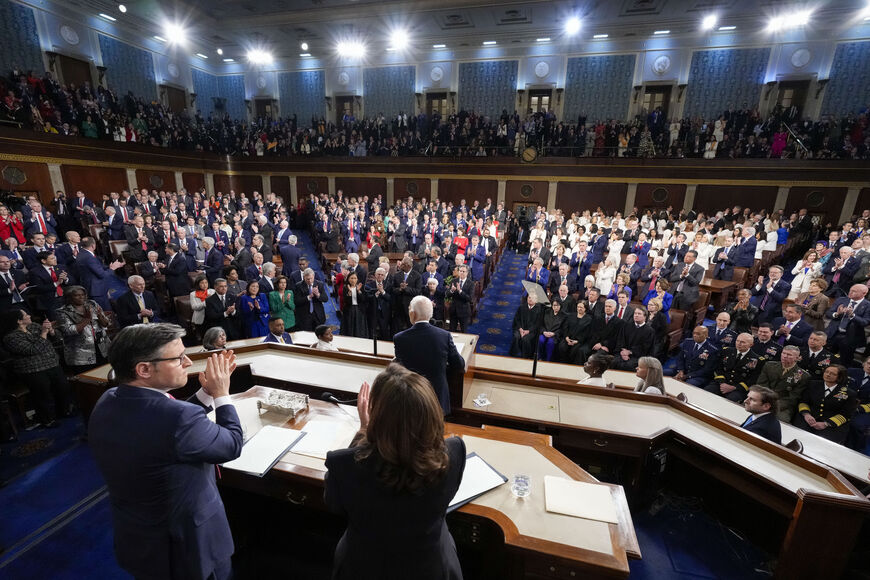 WASHINGTON, DC - MARCH 7: U.S. House Speaker Mike Johnson (R-LA) and Vice President Kamala Harris applaud as President Joe Biden delivers the annual State of the Union address before a joint session of Congress in the House chamber at the Capital building on March 7, 2024 in Washington, DC. This is Biden's final address before the November general election. (Photo by Alex Brandon-Pool/Getty Images)