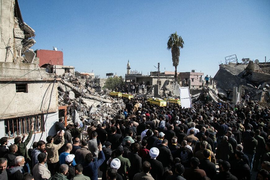 The funeral in Blida, southern Lebanon, for four members of one family killed in an Israeli air raid days earlier -- Lebanon's Hezbollah and Israeli forces have exchanged regular cross-border fire during the Gaza war