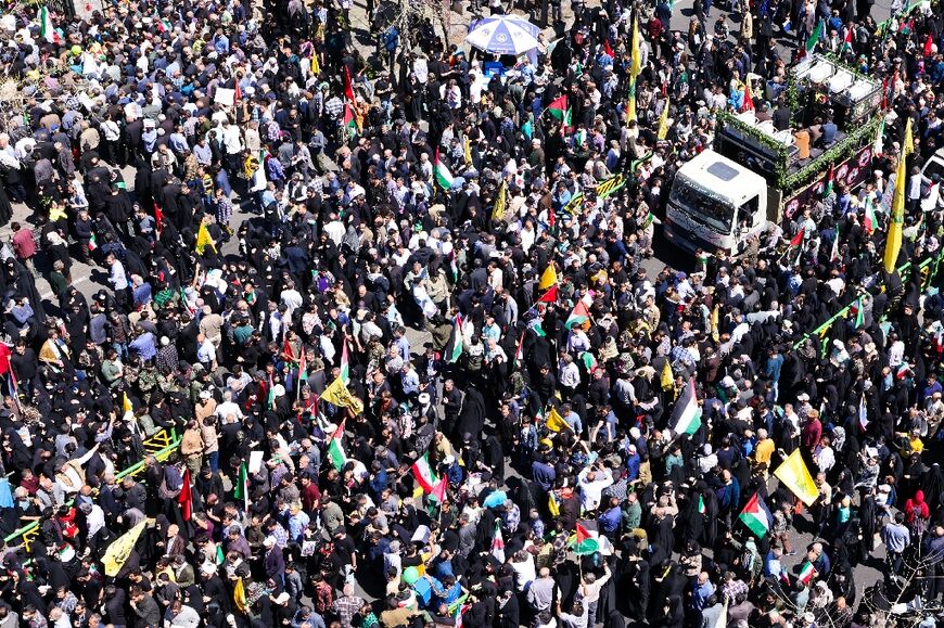 People attend the Tehran funeral of seven Iranian Revolutionary Guard Corps members killed in a strike in Syria which Iran blamed on Israel