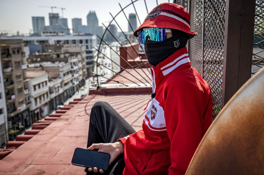 An ultra for Wydad AC football club in the old city of Casablanca, Morocco, where fans have 
been showing support for Palestinians