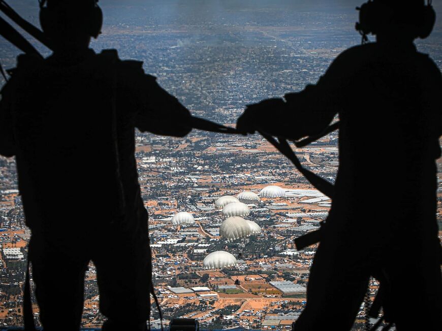 The Jordanian army airdrops humanitarian aid over the Gaza Strip